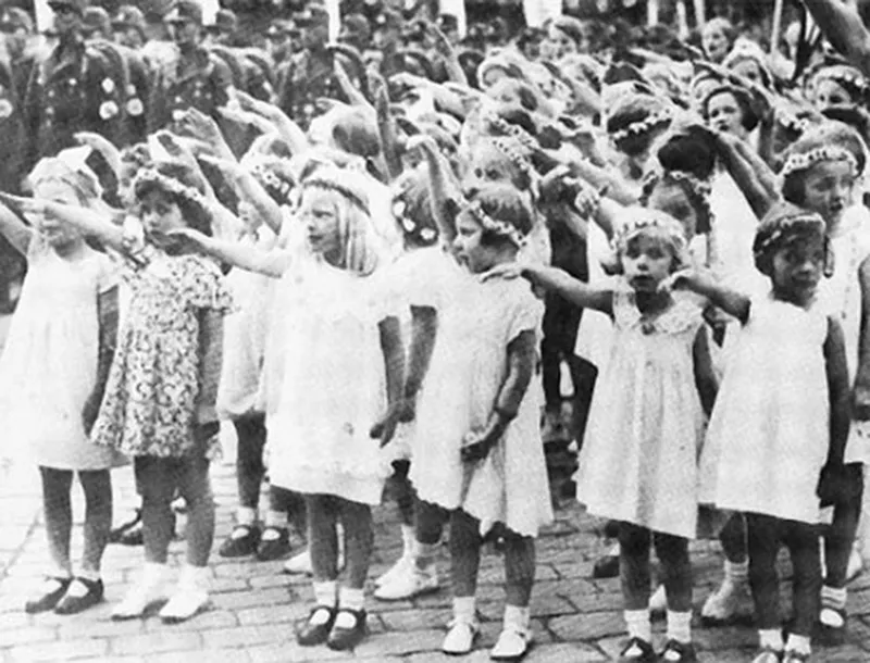 Nazi racial theory maintained that, in order to maintain the so-called purity of the German races, mixed marriages had to be prevented. Little girls, brought ou